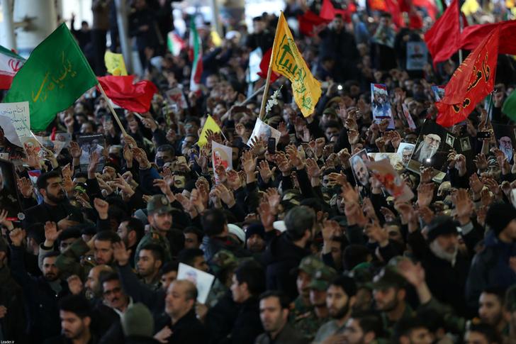 People attend a funeral procession for Iranian Major-General Qassem Soleimani, head of the elite Quds Force, and Iraqi militia commander Abu Mahdi al-Muhandis, who were killed in an air strike at Baghdad airport, in Tehran, Iran January 6, 2020. Official Khamenei website/Handout via REUTERS ATTENTION EDITORS - THIS IMAGE WAS PROVIDED BY A THIRD PARTY. NO RESALES. NO ARCHIVES