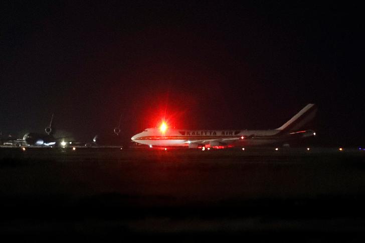 A cargo aircraft chartered by the U.S. government to evacuate American passengers from the cruise ship Diamond Princess, where dozens of passengers were tested positive for coronavirus in Japan, arrives at Travis Air Force Base in Fairfield, California, U.S. February 16, 2020. Picture taken February 16, 2020. REUTERS/Stephen Lam