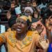 Believers immerse in prayer during a special mass held to usher in the New Year at Full Gospel Bible Fellowship church in Dar es Salaam, Tanzania, on January 1, 2020. (Photo by Ericky BONIPHACE / AFP)