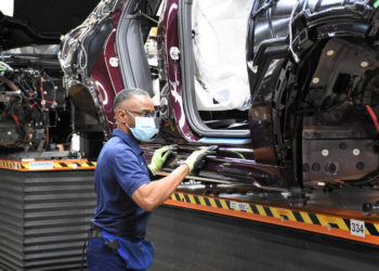A BMW worker assembles an automobile after production restarted at approximately 50% capacity with parts they had on hand from before the coronavirus disease (COVID-19) shutdown in Spartanburg, South Carolina, U.S., May 4, 2020. Picture taken May 4, 2020. BMW/Handout via REUTERS      THIS IMAGE HAS BEEN SUPPLIED BY A THIRD PARTY. NO RESALES. NO ARCHIVES.