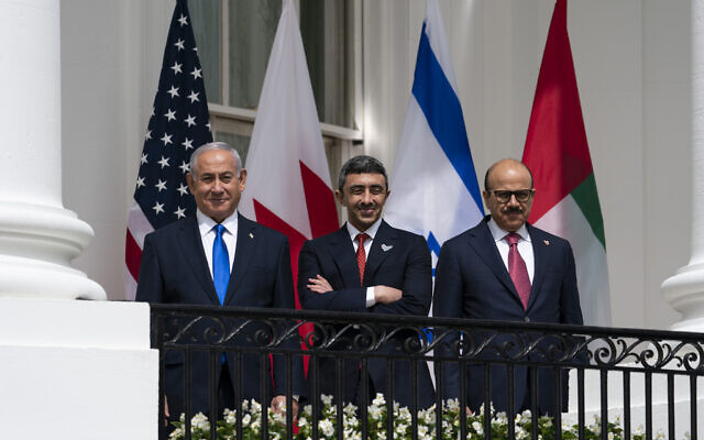 Israeli Prime Minister Benjamin Netanyahu, left, United Arab Emirates Foreign Minister Abdullah bin Zayed al-Nahyan, and Bahrain Foreign Minister Khalid bin Ahmed Al Khalifa stand on the Blue Room Balcony during the Abraham Accords signing ceremony on the South Lawn of the White House, Tuesday, Sept. 15, 2020, in Washington. (AP Photo/Alex Brandon)