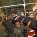 Medics and members of the Israeli security forces evacuate an injured man after the collapse of grandstand seating at a synagogue in the Israeli settlement of Givat Zeev in the occupied West Bank outside Jerusalem, on May 16, 2021, that left at least 60 people injured. - The incident occurred "as hundreds were congregated" for the Jewish Shavuot feast, a spokesman told Israeli channel Kan. (Photo by Gil COHEN-MAGEN / AFP)