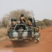FILE PHOTO: Soldiers from Burkina Faso patrol on the road of Gorgadji in the Sahel area, Burkina Faso March 3, 2019. Picture taken March 3, 2019. REUTERS/Luc Gnago/File Photo/File Photo